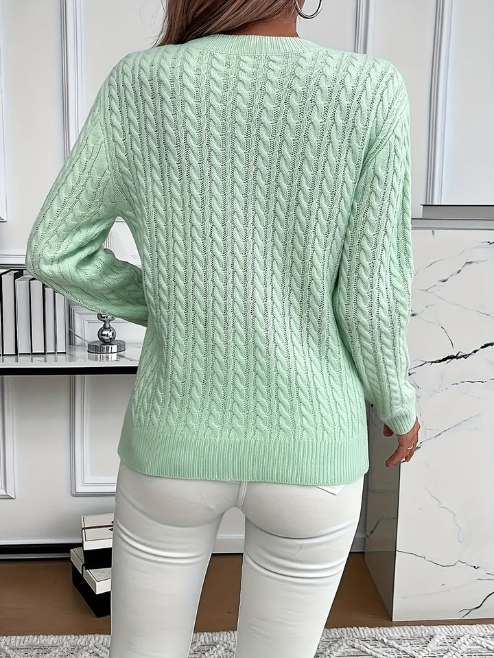 Elegant women's cable knit sweater, soft & stylish. Essential long sleeve knitwear for spring & autumn outfits.