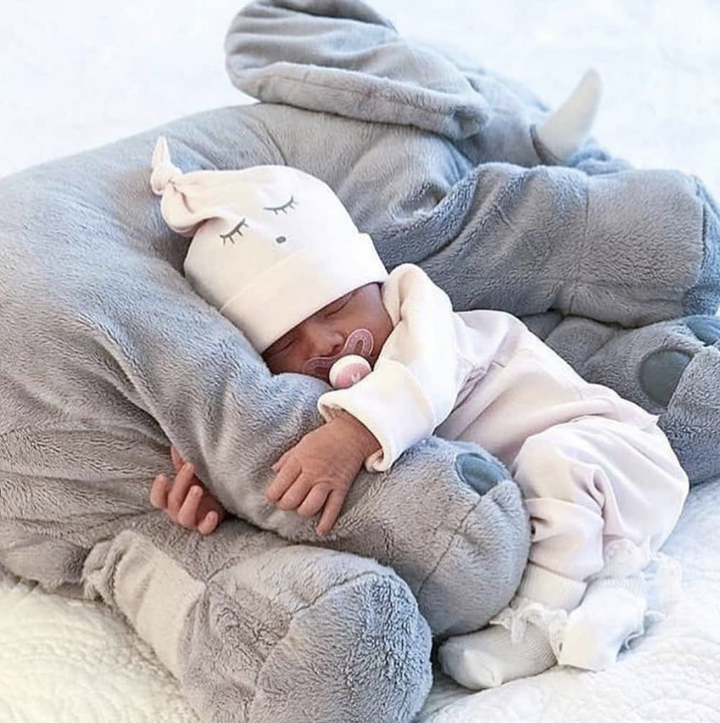 Soft elephant baby pillow, perfect for snuggling & sweet dreams.
