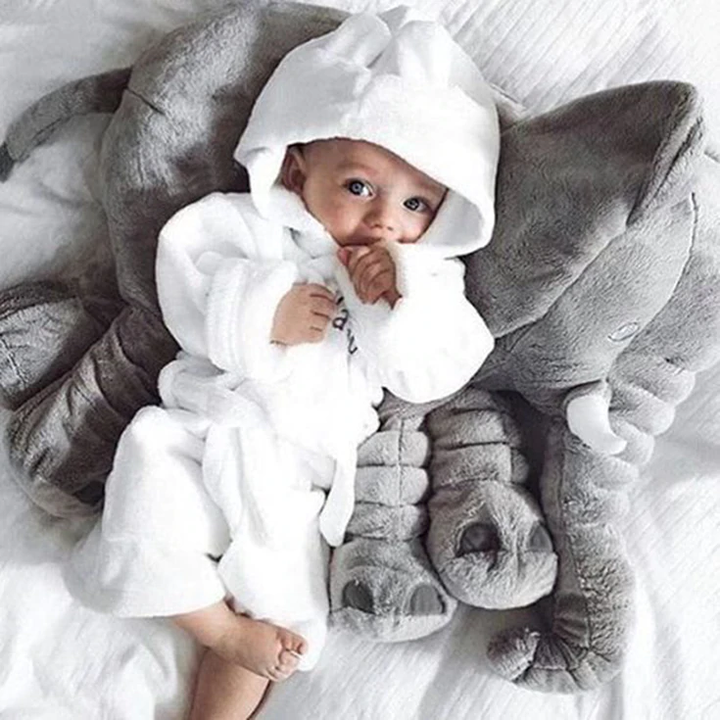 Soft elephant pillow, lovely nursery decor & gentle play toy for babies.