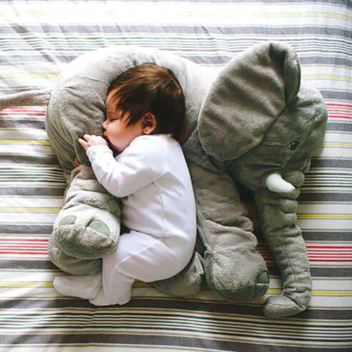 Plush elephant animal pillow, charming kids room decor & cuddle toy.