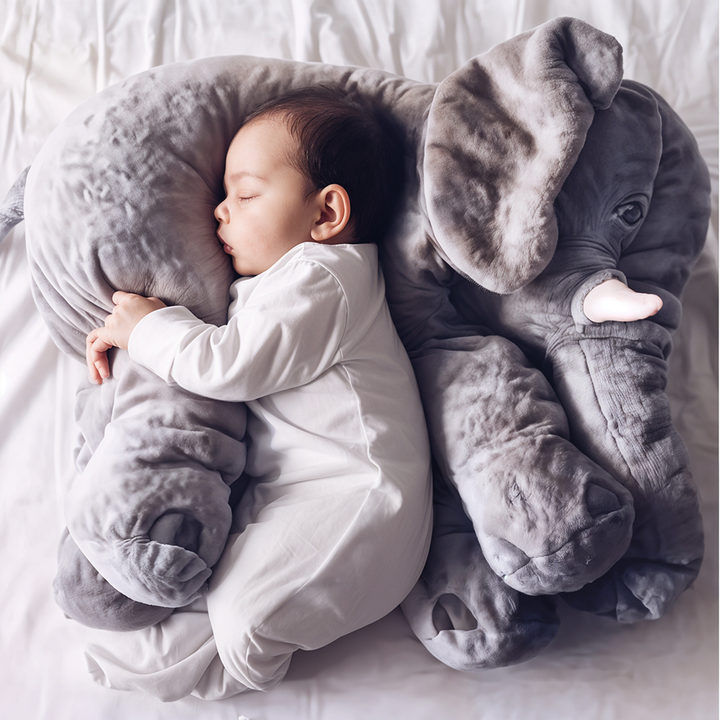 Soft plush elephant pillow for kids. Cuddly nursery decor & comfort animal, perfect for baby's room.