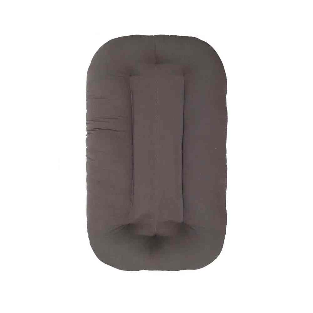 Soft, safe Baby Comfort Sleeping Nest & Lounger for newborns, providing a cozy infant bed for naps & playtime.