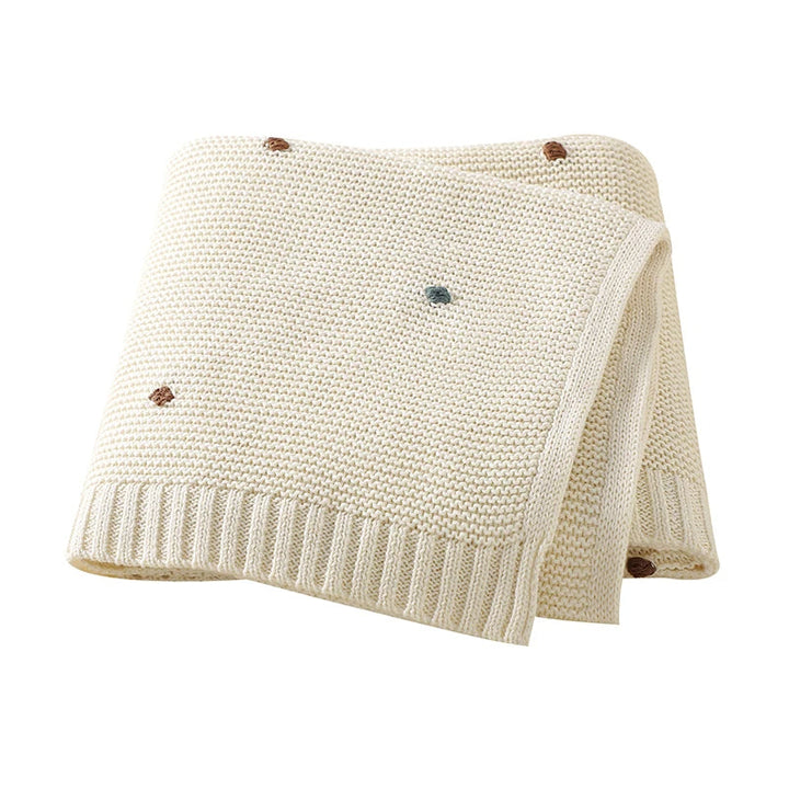 Unisex cotton knitted baby blanket, ideal for all-season comfort, nursery decor & newborn care.