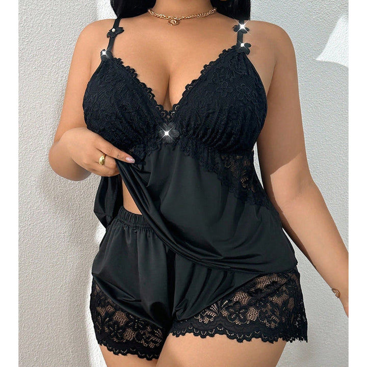 Soft women's pyjama set with elegant lace trim, perfect for comfortable sleepwear.