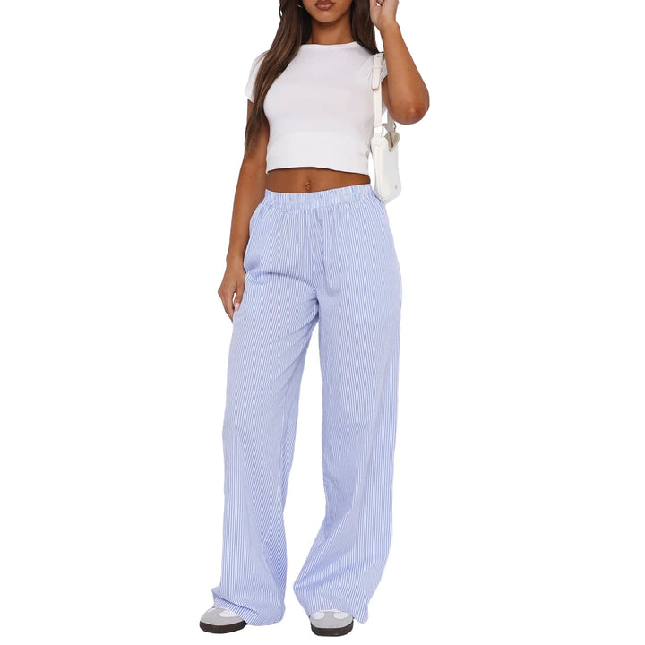 Blue women's soft relaxed fit lounge pants. Ideal comfortable casual wear with elastic waist & convenient pockets.