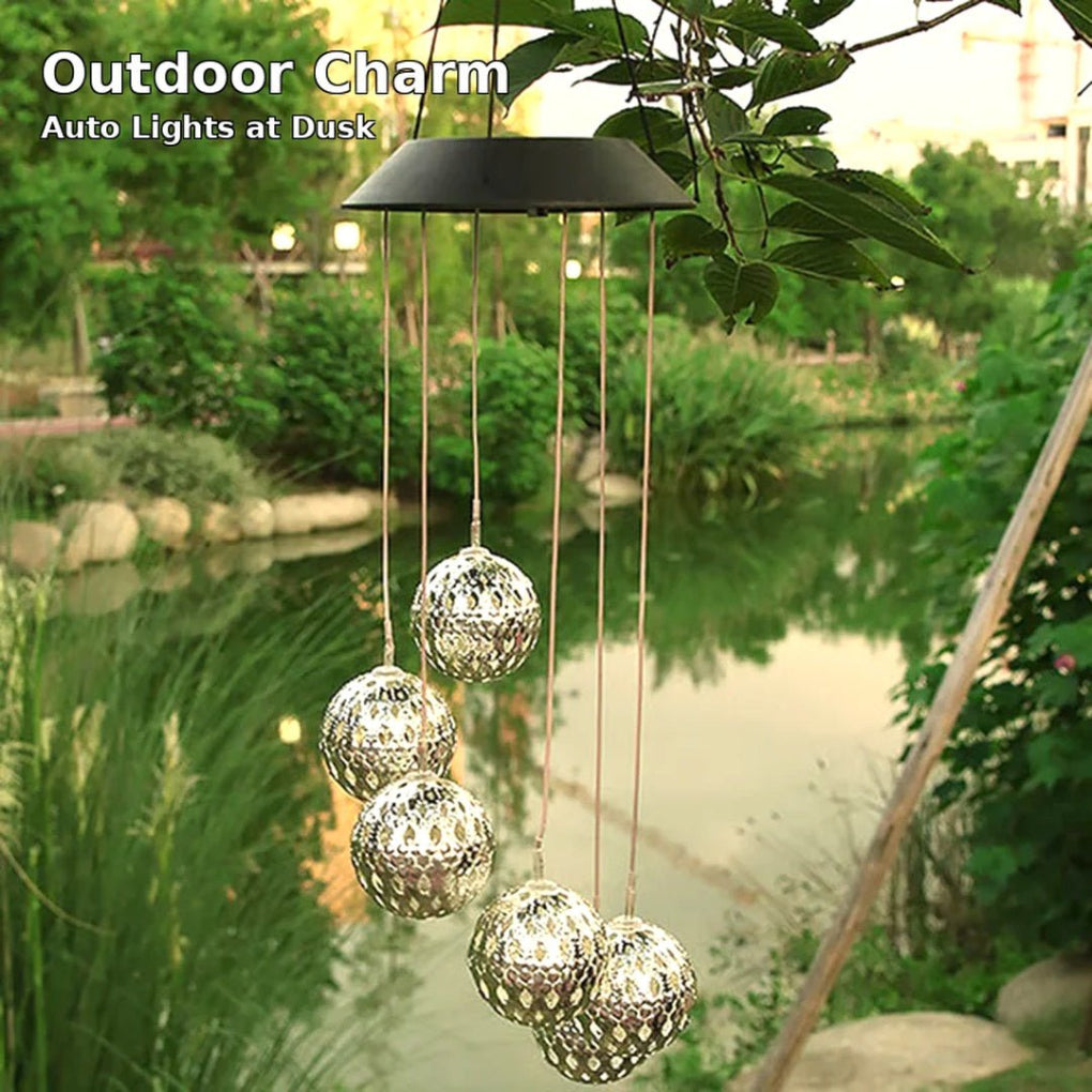 Eco-friendly solar wind chime orb. Features mesmerizing color-changing LED lights, ideal for garden and patio ambiance.