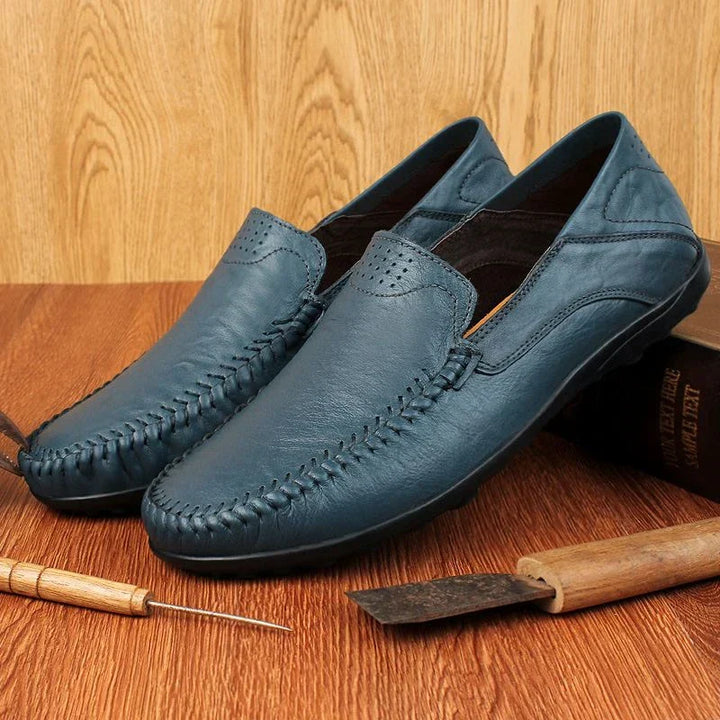 Sophisticated Men's Aure Loafers, elegant slip-on dress shoes perfect for formal or smart-casual occasions.