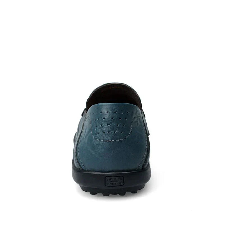 Classic Men's Aure Loafers, sleek slip-on dress shoes designed for sophisticated style and everyday comfort.