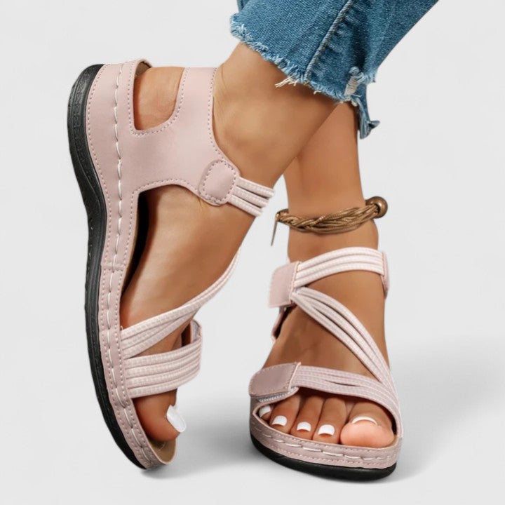 Women's walking sandals with advanced arch support and cushioning for all-day pain relief.