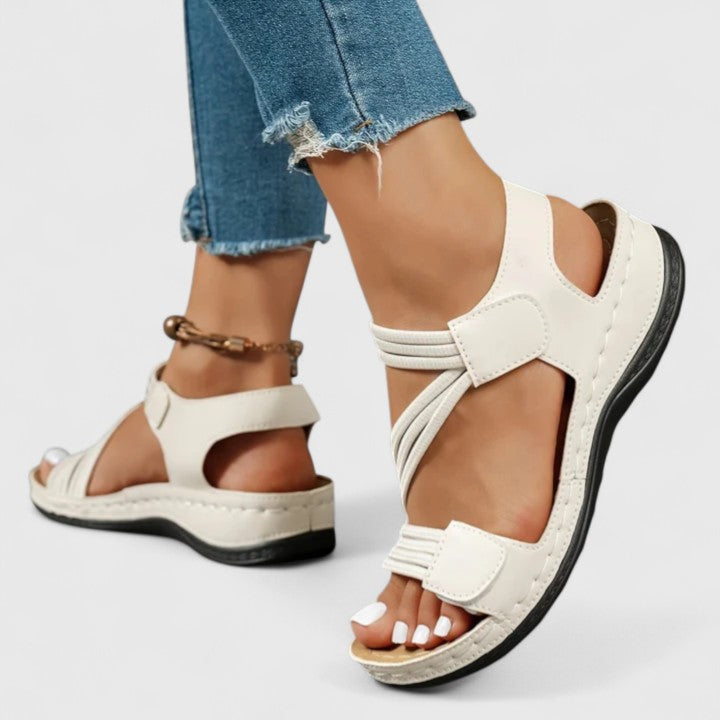 Durable women's orthopedic walking sandals, engineered for foot comfort & posture correction.