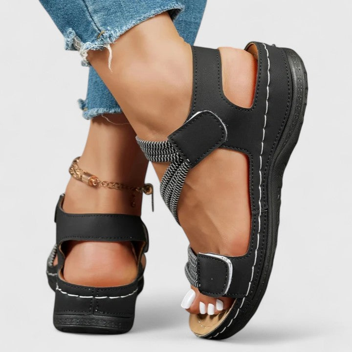 Women's pain relief sandals with deep arch support, ideal for daily wear and foot health.