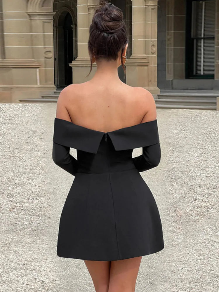 Fashionable women's off-shoulder skater dress. Elegant party & evening wear for a chic girls' night out.