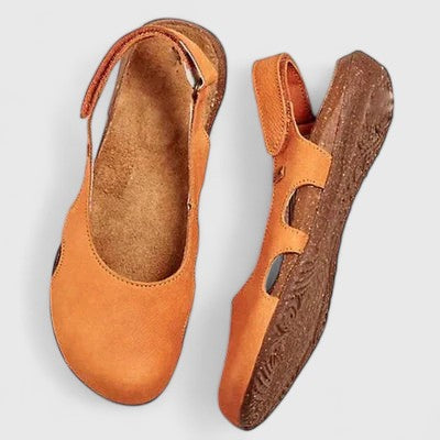 Stylish women's walking sandals offering superior comfort, arch support & adjustable strap for secure fit.