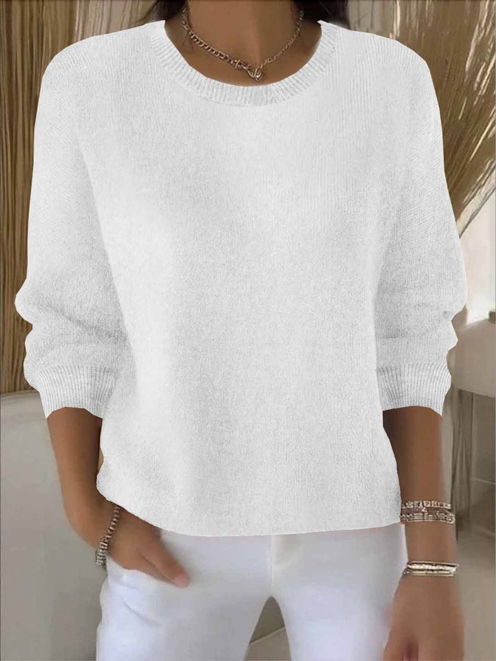 Chic women's sweater, a sophisticated long-sleeve top perfect for elegant comfort & winter style.