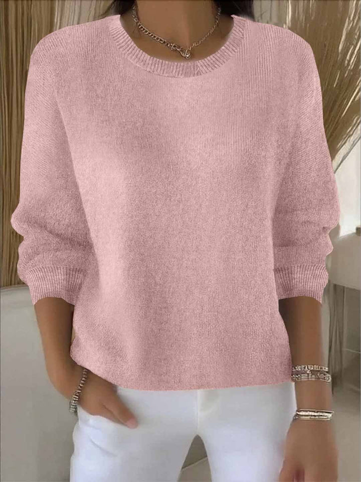 Versatile long-sleeve women's jumper, a sophisticated cozy top for elegant comfort & everyday wear.