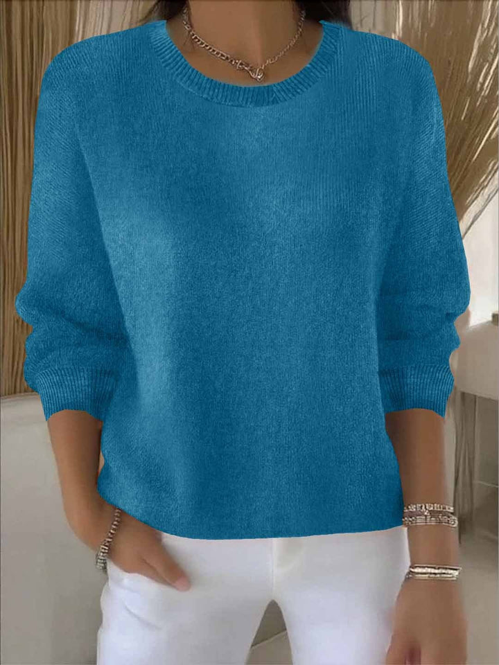 Cozy elegant women's sweater, a versatile long-sleeve top for sophisticated fall & winter style.