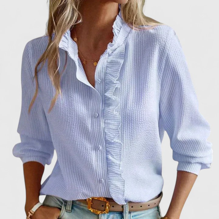 Sophisticated women's long sleeve blouse for elegant wear, perfect for work or casual chic. Relaxed fit, stand collar.