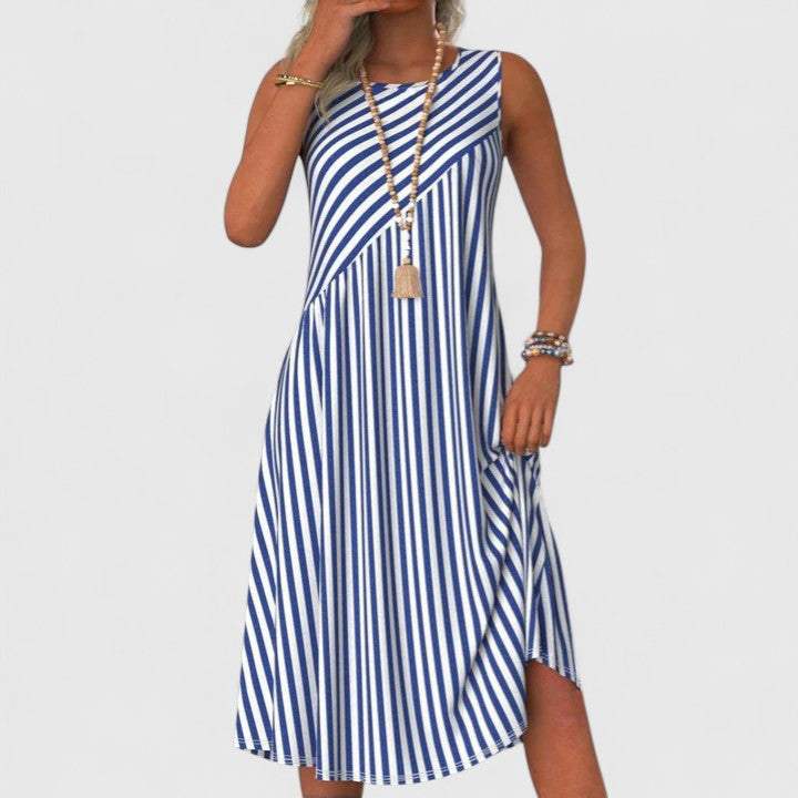Sophisticated women's striped A-line summer dress, perfect for brunch or a casual beach outing. Sleeveless and versatile.
