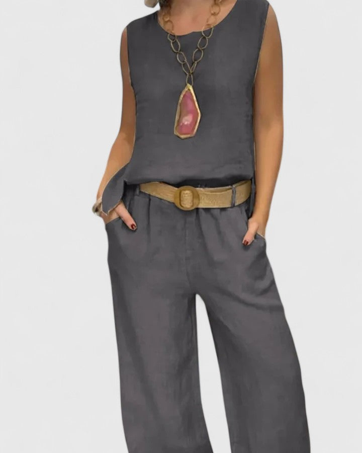 Elegant women's matching set: sleeveless top & wide leg pants with pockets, offering comfort & versatile style.