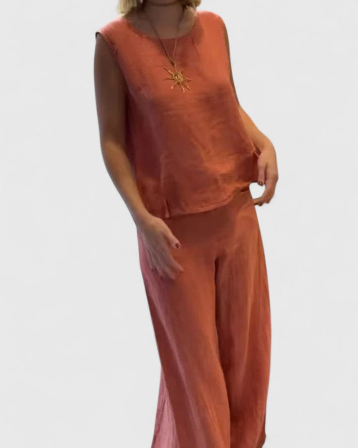Stylish women's matching two-piece set: sleeveless top and elegant wide leg pants for a sophisticated look.