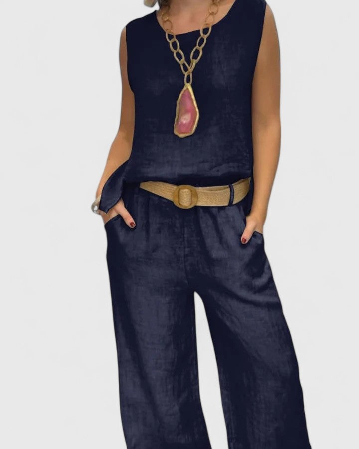 Sophisticated women's two-piece outfit with elegant wide leg pants & sleeveless top, ideal for modern chic.