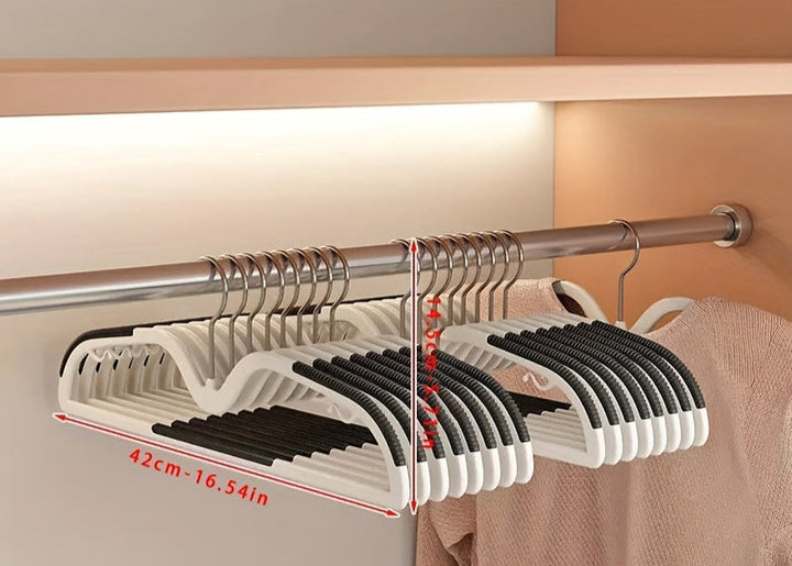 Modern short neck non-slip hangers with rotating hooks to optimize space in any organized closet.