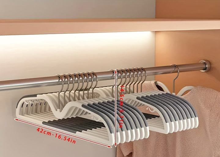 Durable plastic short neck hangers with non-slip grip, perfect for organized, space-saving closets.