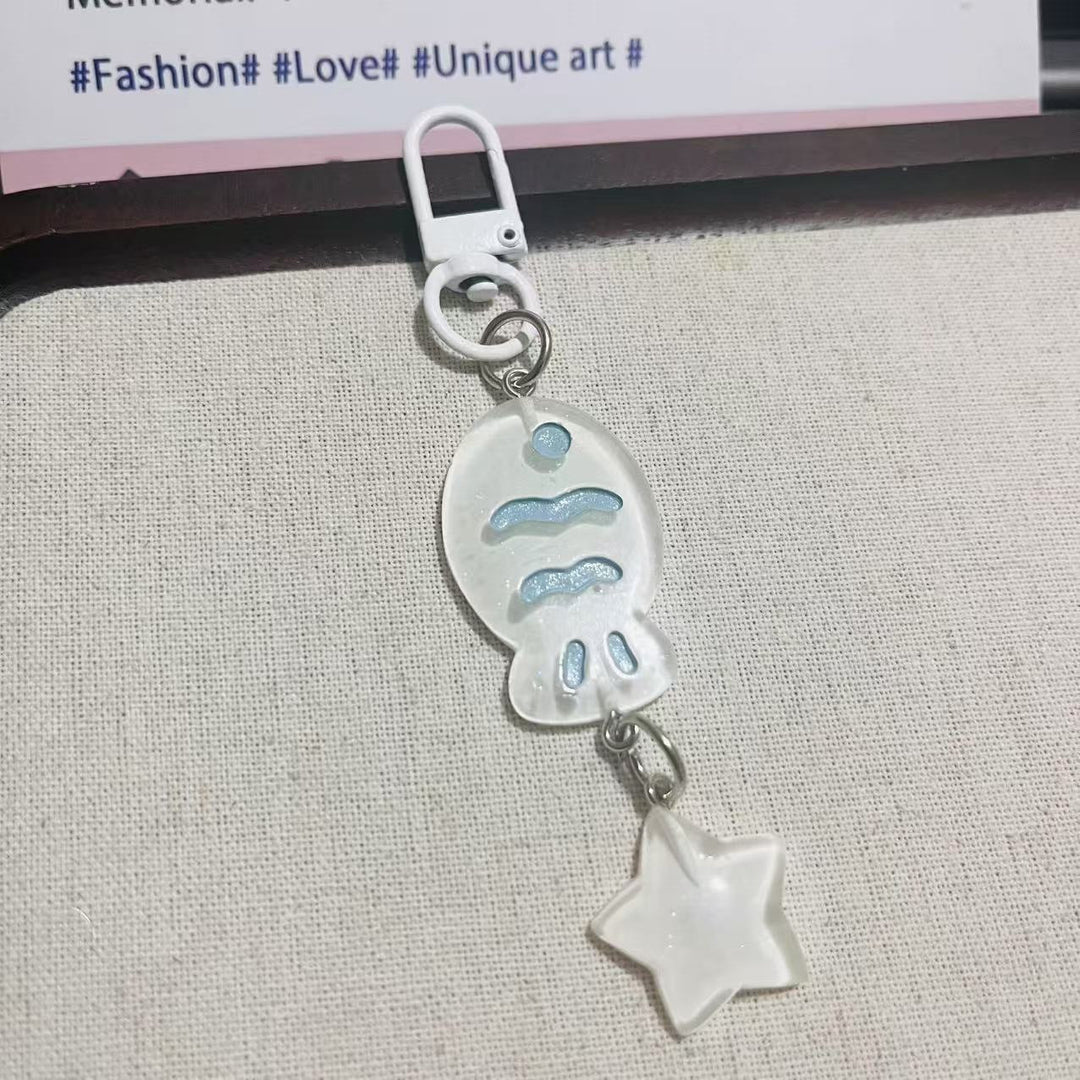 Sparkling acrylic fish & star keychain. Cute unisex bag charm & accessory, great gift idea.