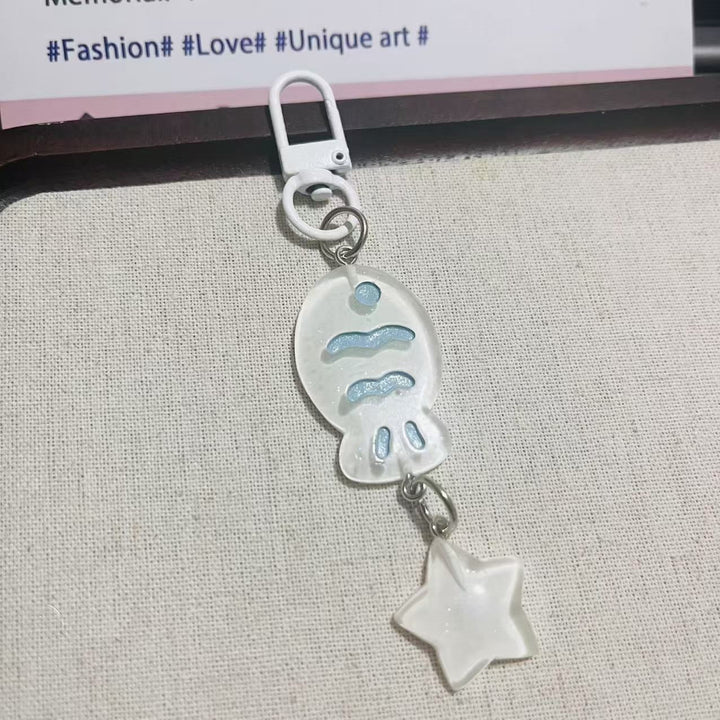 Sparkling acrylic fish & star keychain. Cute unisex bag charm & accessory, great gift idea.
