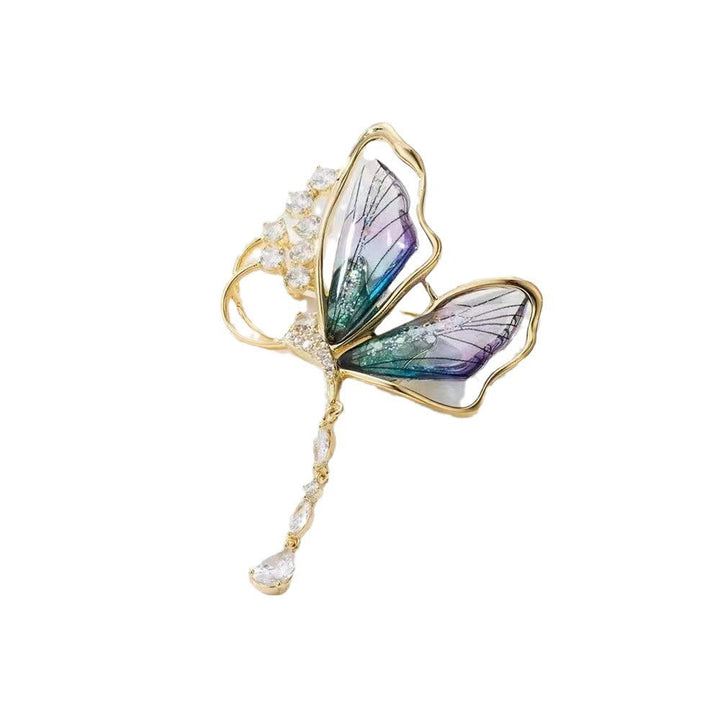 Exquisite sparkling butterfly brooch featuring shimmering glitter stones, a stylish women's fashion accessory pin.
