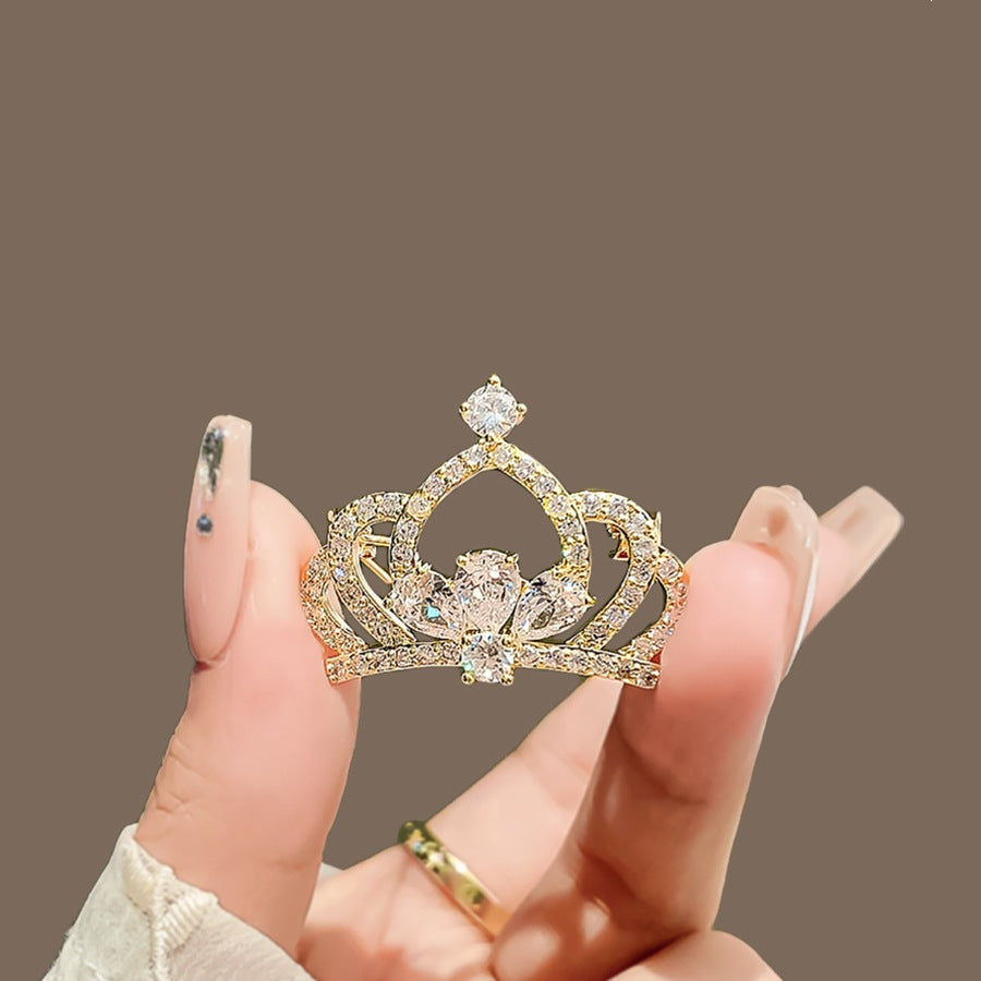 Glamorous crystal crown pin brooch, perfect sparkling women's jewelry accessory to elevate any outfit.