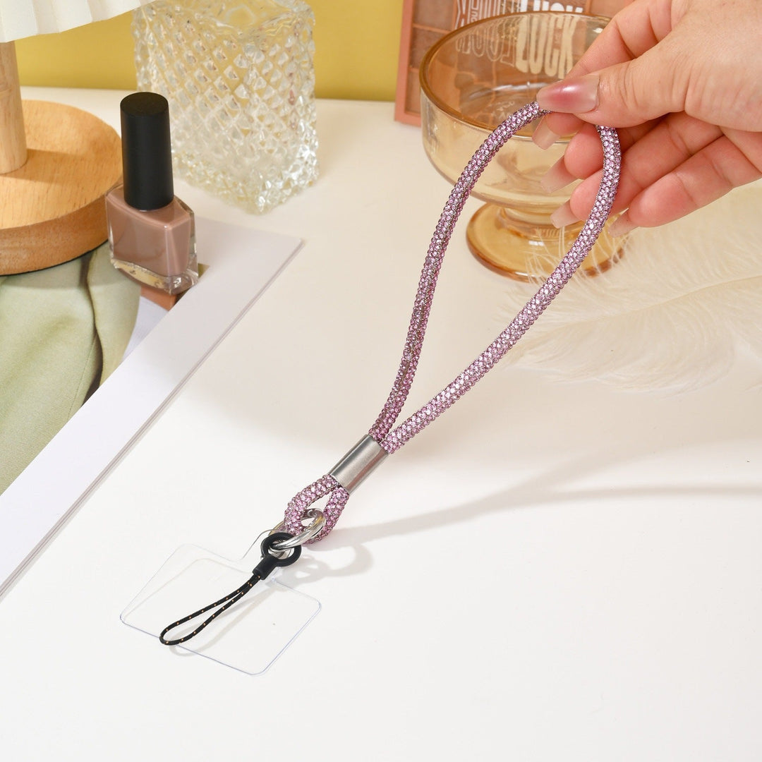 Perfect gift: Unisex sparkling crystal wrist strap lanyard. Stylish accessory for phone, keys, and badge holders.