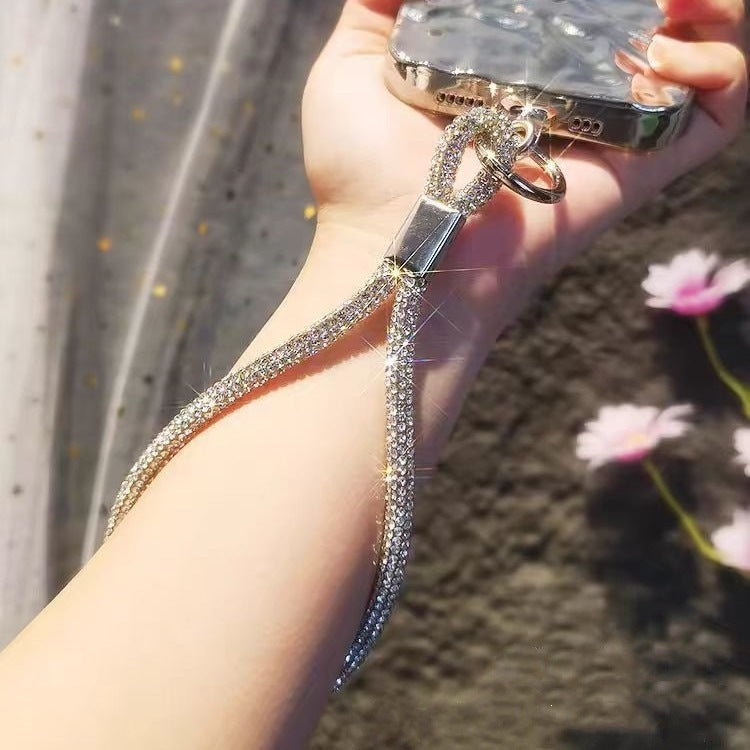 Glamorous sparkling crystal wrist strap lanyard. Stylish accessory for keychains, phones, and badge holders.
