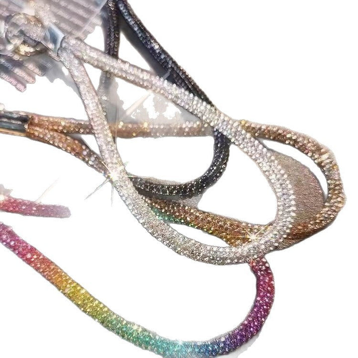 Bling crystal wrist strap lanyard provides secure carry for phones, keys, and badges. Unisex fashion accessory.