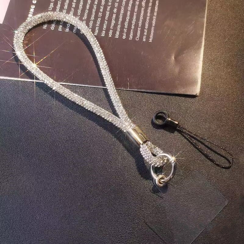 Secure and stylish sparkling crystal wrist strap. Unisex lanyard for phones, keys, and ID badges. Fashion accessory.