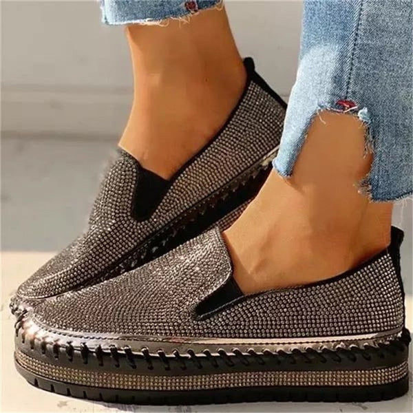Sparkling gold women's slip-on shoes. Effortless glamour for parties, summer, or elegant casual outfits. Comfortable & lightweight.