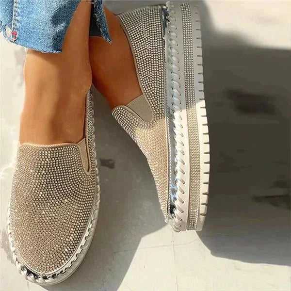 Women's sparkling slip-on shoes offering effortless glamour. Ideal for parties, summer, or stylish casual occasions. Lightweight.