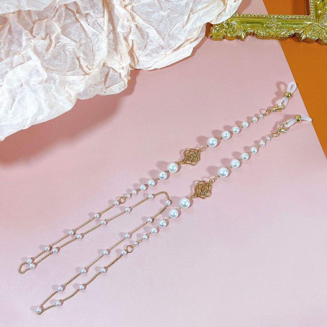 Elegant sparkling pearl & floral glasses chain, a fashionable beaded eyeglass holder and eyewear accessory.