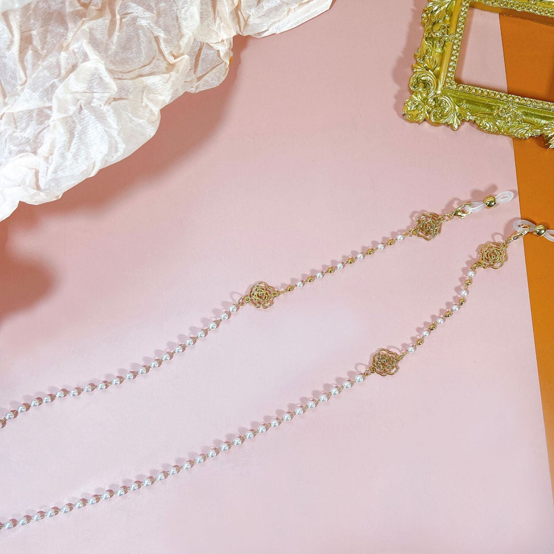 Sparkling beaded pearl & floral glasses chain, an eye-catching eyeglass holder and stylish eyewear accessory.