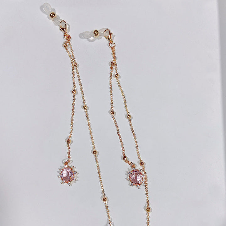 Beautiful women's crystal necklace featuring a vibrant pink sparkling pendant, fashion accessory.