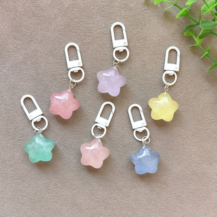 Resin heart keychain with glitter, sparkling women's bag accessory & key gift.