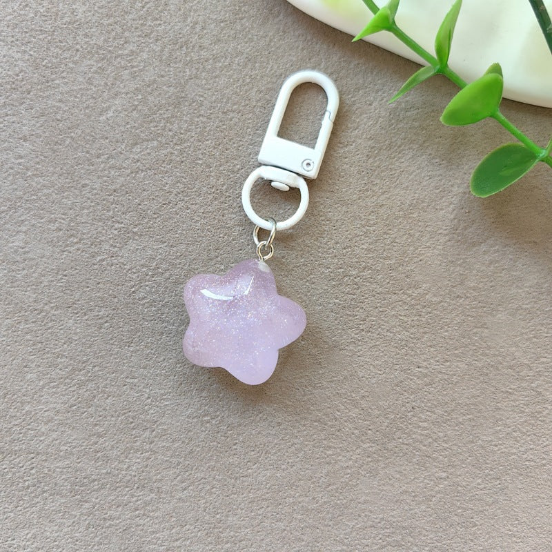 Gift-ready sparkling heart keychain, cute women's glitter resin accessory.