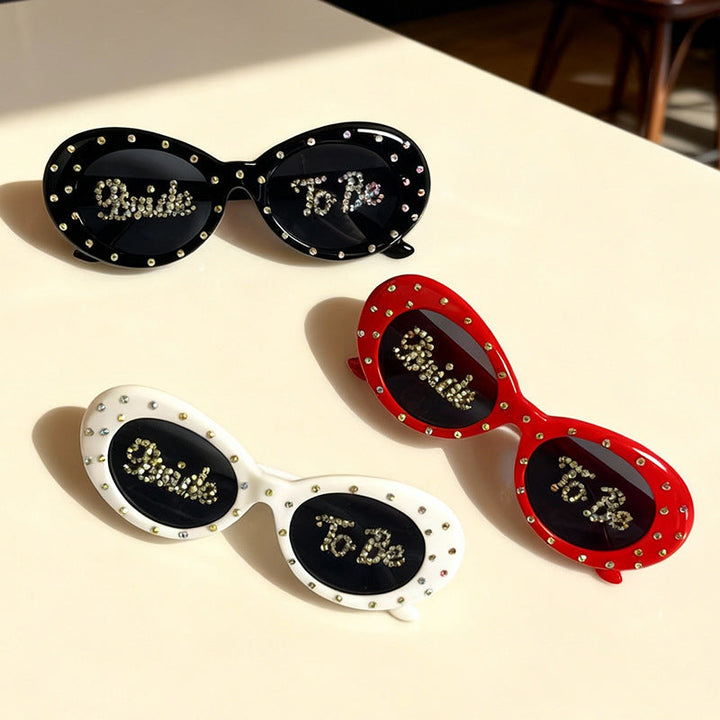Chic women's cat-eye rhinestone sunglasses, a sparkling fashion statement for brides.