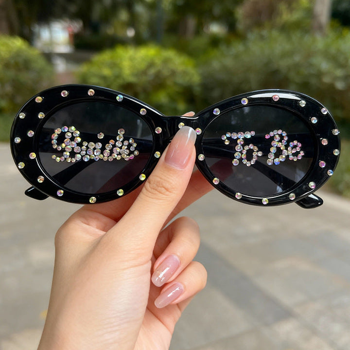 Sparkling rhinestone cat-eye sunglasses for women's bachelorette party or bridal shower.
