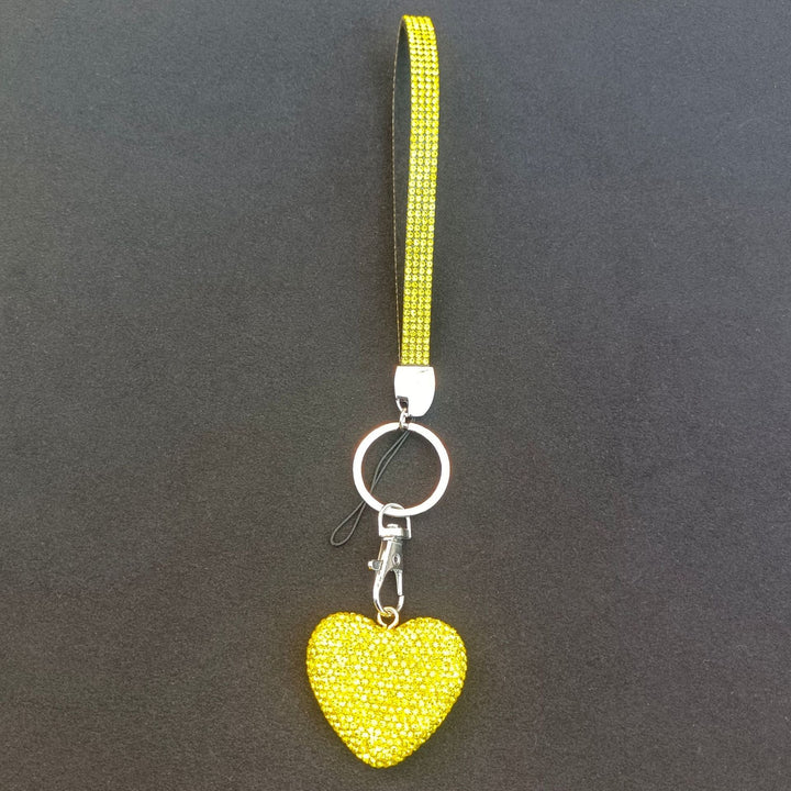 Sparkling rhinestone heart charm for women's keychains & bags. Adds elegance & dazzle to any accessory.