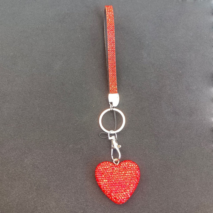Women's sparkly heart rhinestone bag charm. Stylish accessory for keys, purses, & backpacks. Elegant gift.