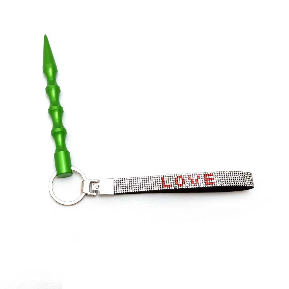 Gold-tone love heart rhinestone key ring, a luxurious bag accessory.