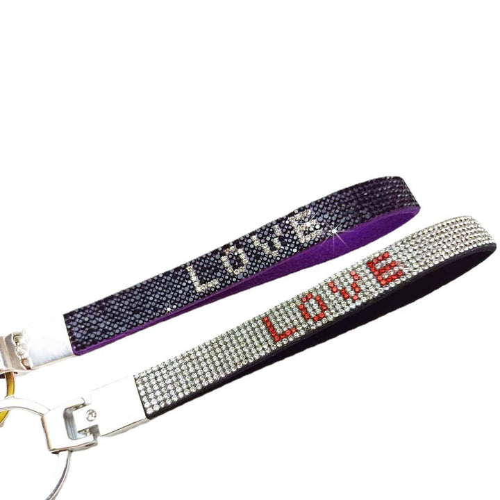 Stylish women's love charm key holder with dazzling rhinestones.