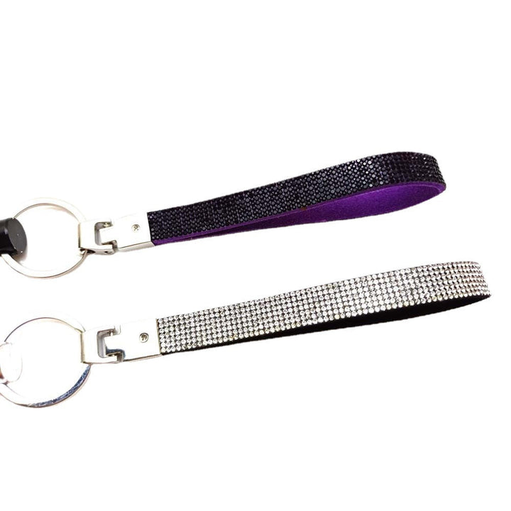 Elegant rhinestone encrusted 'LOVE' letter keychain, a perfect bag accessory.