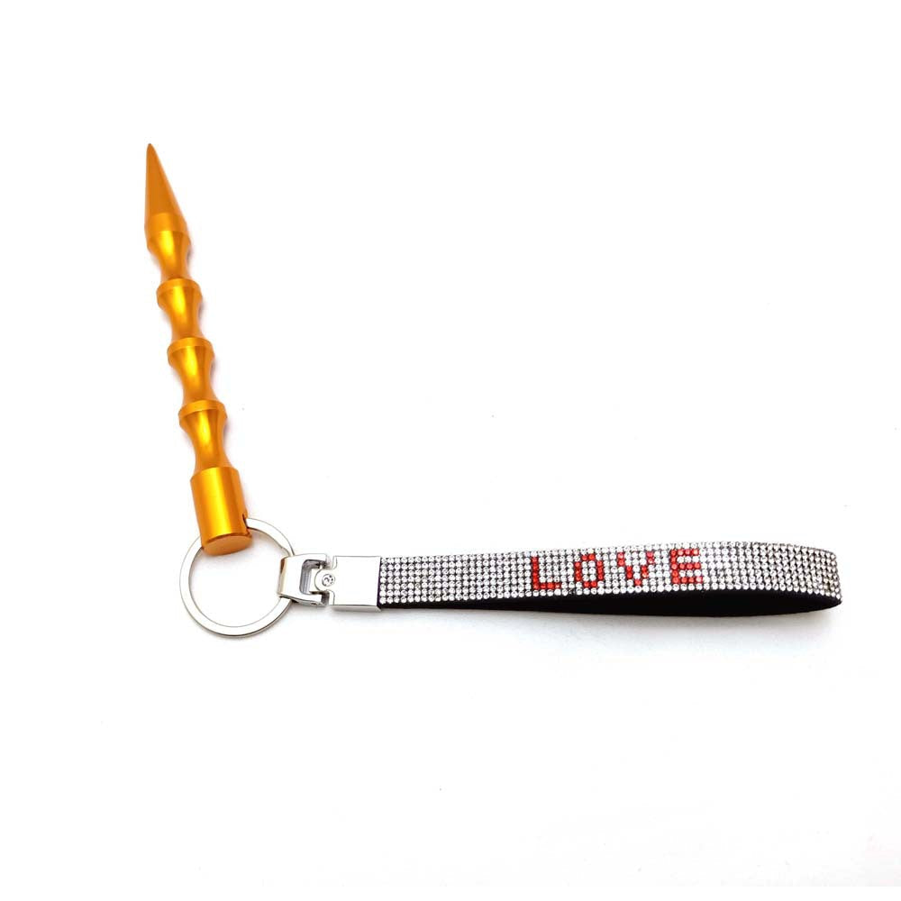 Pink rhinestone 'LOVE' keychain, a charming and stylish key holder.